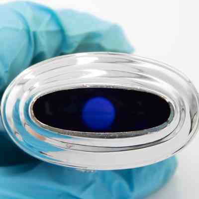 Inside of the silver and blue cobalt glass lighter.: Up close image of the inside of the silver and blue cobalt glass lighter.