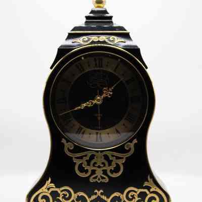 Black Jaeger Petite Neuchateloise Clock with Gold Detail