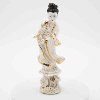 White Porcelain Figurine of Woman Holding Flower with Gold Trim