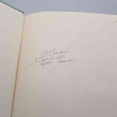 Inside Signature: Inside “The Arabia of Ibn Saud” is a signature in black ink. It reads "L.T. Jordan Compliments from (illegible)"