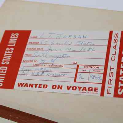 United States Lines "WANTED ON VOYAGE" Label: A red and white luggage tag to be delivered for  L.T. Jordan during a cruise on the S.S. United States under the United States Lines in 1957. It was likely sent to be delivered by H.R.P. Dickson.
