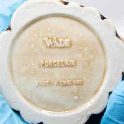 Bottom of ceramic: The bottom is white with the words, "Wade; porcelain; Made in England."