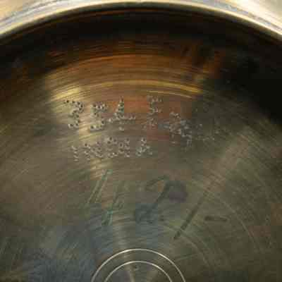 Bottom of urn: The bottom of the urn has illegible numbers as well as "India" stamped.