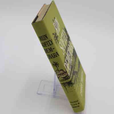 Book Spine of “Run Softly Demerara”: The spine of “Run Softly Demerara” features the book title, author's full name, and name of the publisher.