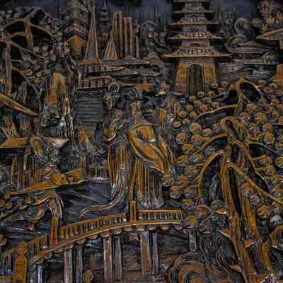 Round carved Hong Kong table: The image features a round, intricately carved table with a glass top, depicting a traditional Hong Kong scene.