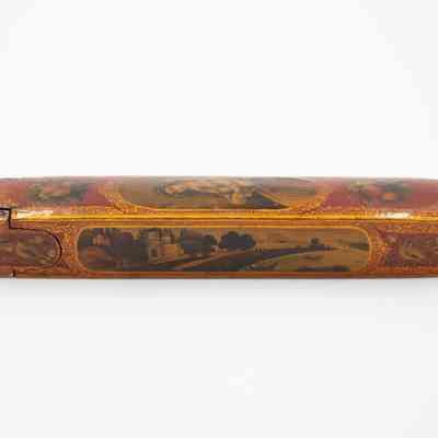 Side of fan case: A beautifully decorated Spanish fan case displays intricate paintings and floral designs. A Spanish castle is featured on the side.