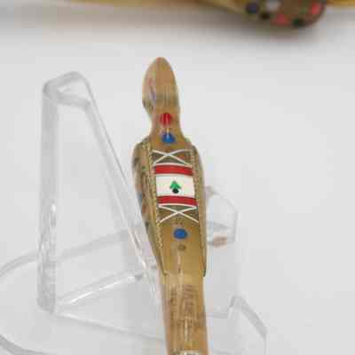Handle: The seahorse handle features the Lebanon flag and colorful decorations.