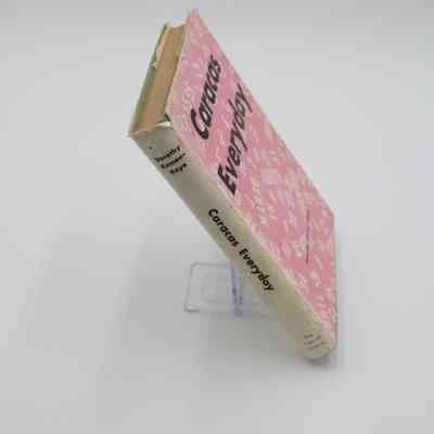 Spine of "Caracas Everyday.": The spine is white with black vertical text.