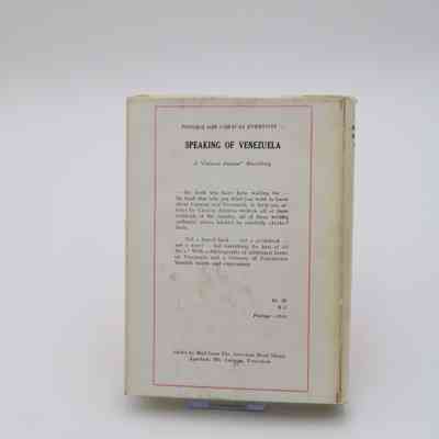 Back cover of "Caracas Everyday": The back cover of "Caracas Everyday" is white with a pink box framing a recommendation for "Speaking of Venezuela."