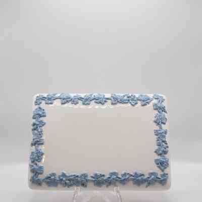 Cigarette box: The image shows a white Wedgwood rectangular piece with blue ivy detailing around the edges.
