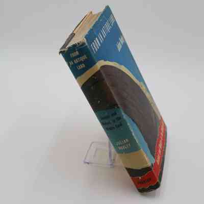 Book Spine: The spine of "From an Antique Land" features the title, subtitle, author name, and publisher.
