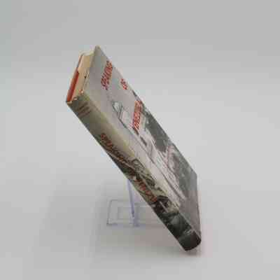 Spine of "Speaking of Venezuela": The spine has the photo from the cover wrapping around it with red text reading "Speaking of Venezuela."