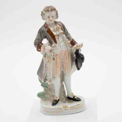 Porcelain Figurine of Man Holding Black Hat in Colonial Dress