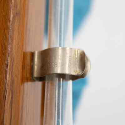 Engraving on mini yard of ale: "Terry's," is engraved onto the metal holing up the yard of ale.