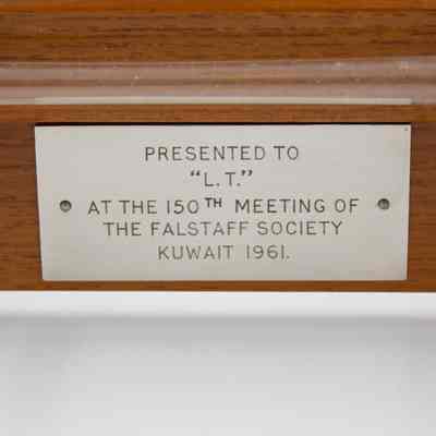 Dedication on yard of ale: "Presented to "L.T." at the 150th meeting of the Falstaff Society; Kuwait 1961."