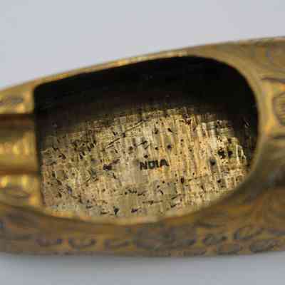 Stamp inside shoe: ”INDIA” is stamped inside the shoe.
