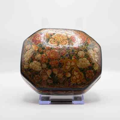 Paper mache box: The image features an intricately decorated box with paper mache colorful floral patterns and a glossy finish.