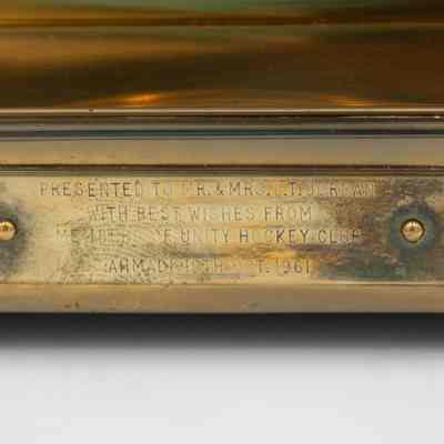 Plaque on clock: "Presented to Mr. and Mrs. L.T. Jordan; with best wishes from members of Unity Hockey Club; Ahmadi, 19th Oct. 1961."