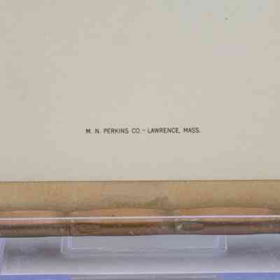 Certificate Maker: Close-up image of the certificate producer's name, M.N. Perkins Company based out of Lawrence, Massachusetts.
