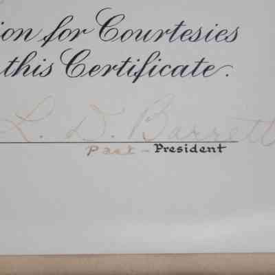 President Signature: Close-up image of the location of where the President of the Lufkin Rotary Club would sign. L.D. Barrett is written in a faded ink. Also in faded ink is "Past-" next to the title of president.