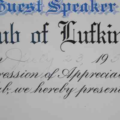 Certificate Date: Close-up image of the certificate showing the written date of the guest speaker's appearance. It is written in a faint black ink and the date was July 23, 1956.