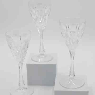 Three wine glasses: The image showcases three of the crystal cut white wine stemware from Venezuela.