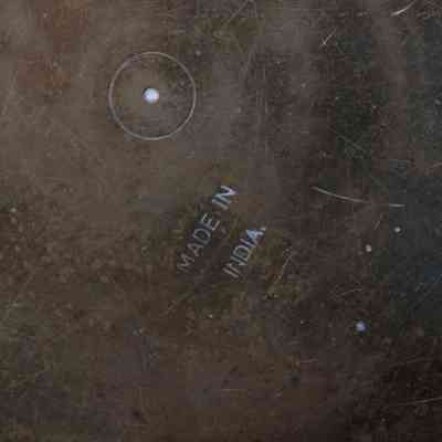Bottom of pot with stamp: The bottom of the pot has a stamp reading, "Made in India."