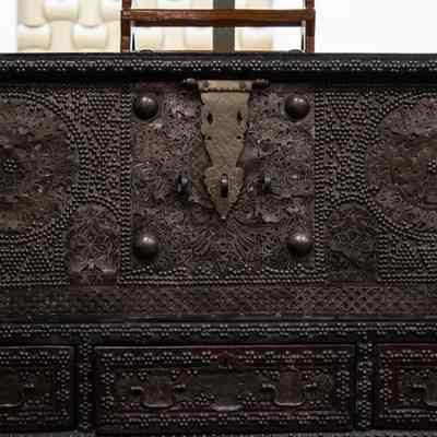 Wedding chest: The ornate wedding chest features intricate metalwork design.