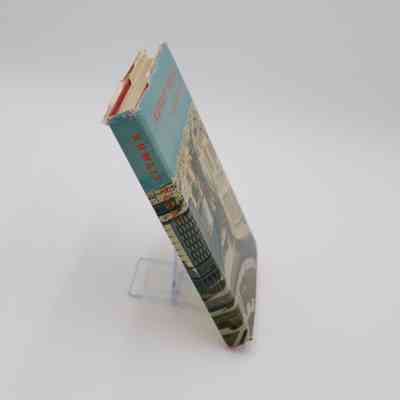 Spine of "Kuwait Today": Spine of "Kuwait Today" has the image from the cover continuing and the title vertically down the spine.