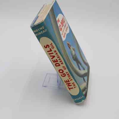 Spine of "The Go Devils": The spine has the title, unaltered, as well as the author and publisher.