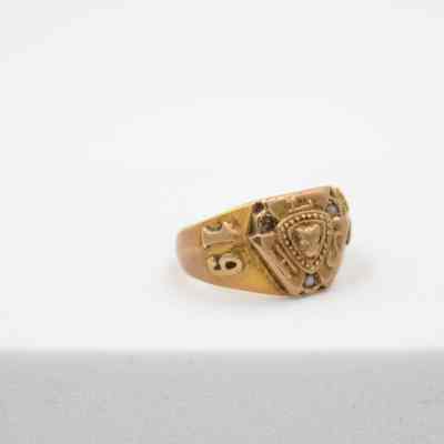 Side of Jessie Wright Jordan's Lufkin High School 1925 class ring.: Up close image of the right side of Jessie's class ring. Embossed with the number "19."