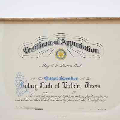 Certificate: Close-up image of the certificate's text. L.T. Jordan is written in faded ink in the space to specify what guest speaker made an appearance.