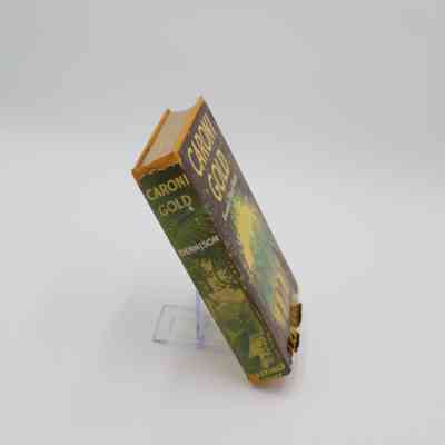 Book Spine: The spine of “Caroni Gold” features the book title, author's last name, and the publisher.