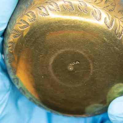 Bottom of finger bowl: "INDIA" is carved into the bottom of the bowl.