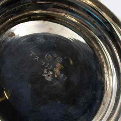 Engraving on bottom of scalloped bowl: “TX 4334887”