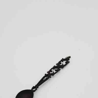 Carved Black Wooden Spoon