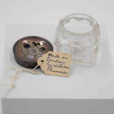 Note inside one bottle: A small tag stored inside the bottle, "Made in London by William Plummer."