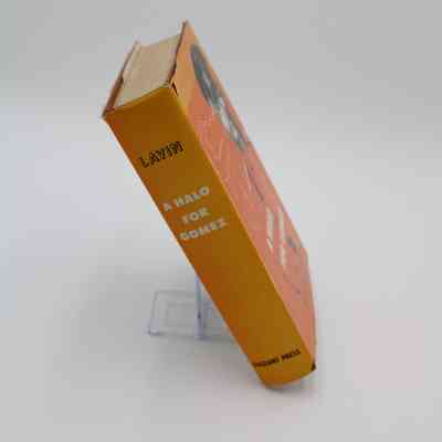 Book Spine of “A Halo for Gomez”: The book spine of “A Halo for Gomez” is yellow and has the book title in white capital block letters. It also has the book's publisher "Pageant Press" on the bottom in black capital letters.
