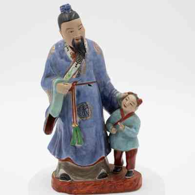 Painted Porcelain Figurine of Mongolian Man with Boy