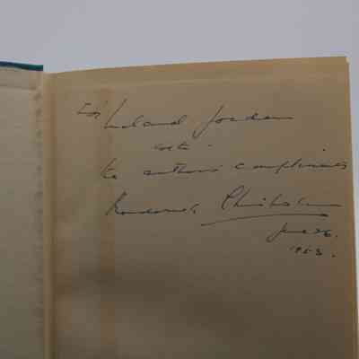 Inside Signature: Inside “Cover of Darkness” is writing in blue ink. It reads "For Leland Jordan with the author's compliments, Roderick Chisholm June 26, 1953."