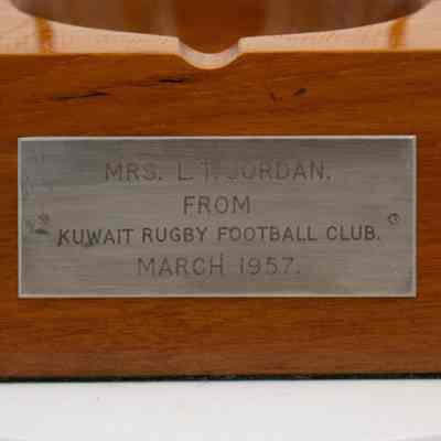 Plaque on ashtray: A silver plaque engraved with "MRS. L.T. JORDAN. FROM KUWAIT RUGBY FOOTBALL CLUB. MARCH 1957."