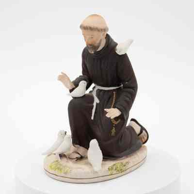 Painted Porcelain Figurine of St. Francis of Assisi Kneeling with Birds