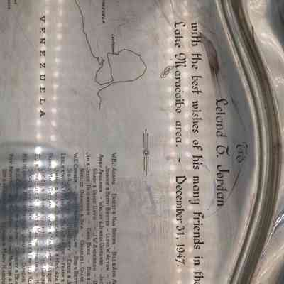 Silver tray: The silver platter features intricate engravings dedicated to L.T. Jordan, from Lake Maracaibo, Venezuela