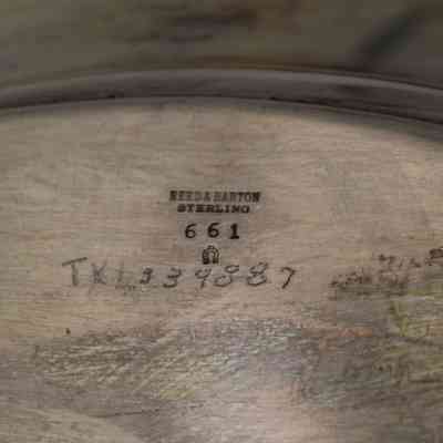 Engravings on bottom of tray: "Reed and Barrow sterling; 661; TXL 334887."