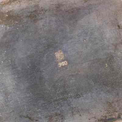 Cigarette box: Bottom of cigarette box has "900" engraved.