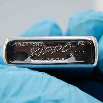 Bottom of lighter: Bottom of steel lighter has engraved "BRADFORD, PA, ZIPPO PAT. 2517191"