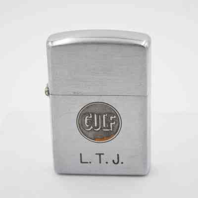L.T.J. Gulf Oil Company Zippo: The steel lighter centrally has a circle with "GULF" in big letters, with "L. T. J." engraved underneath.