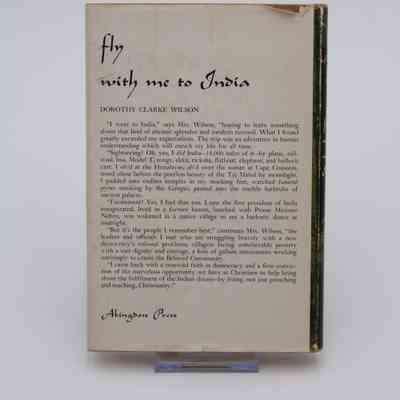 Back Cover: The back cover of “Fly with Me to India" features a transcription of a dialogue by the author about the travels she did for this book written in the third person.