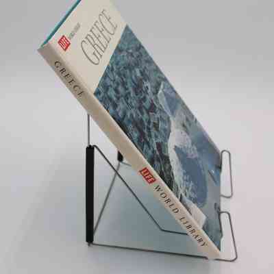 Book Spine of "Greece": The spine of "Greece" features the book title and the creator of the book.