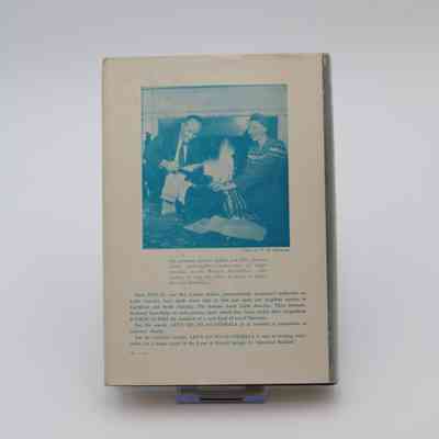 Back cover of "Let's go to Guatemala": The back cover of "Let's go to Guatemala" features a white background with vibrant blue text, and a blue-and-white image of the authors. The blurb provides credibility to the authors.